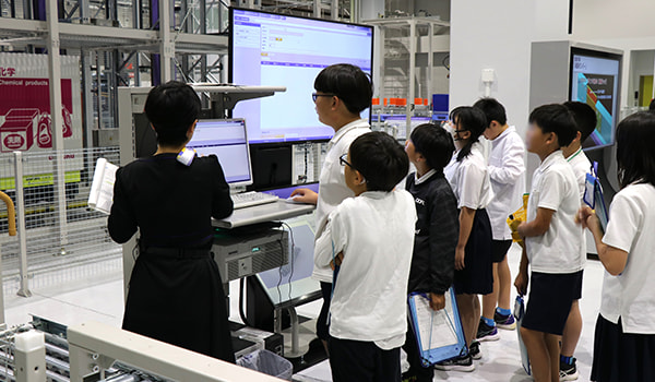 Using a computer to unload products from an automatic storage and retrieval system (AS/RS)